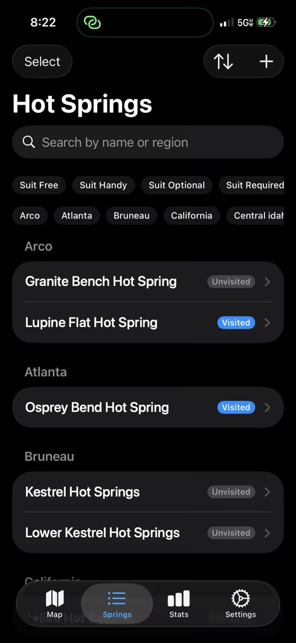 The Hot Springs list grouped by region, with tag and region filters and a visited or unvisited badge on each spring.